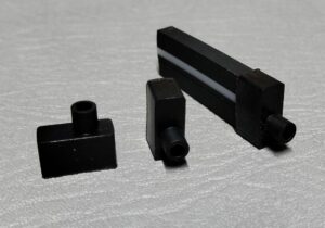7800472 TAPA SILICONA NEGRA CON HUECO PARA FLR0616N 1
